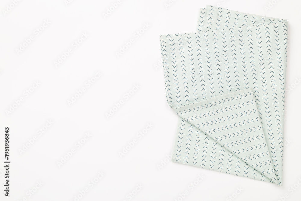 Fototapeta premium Kitchen napkin on color background, top view