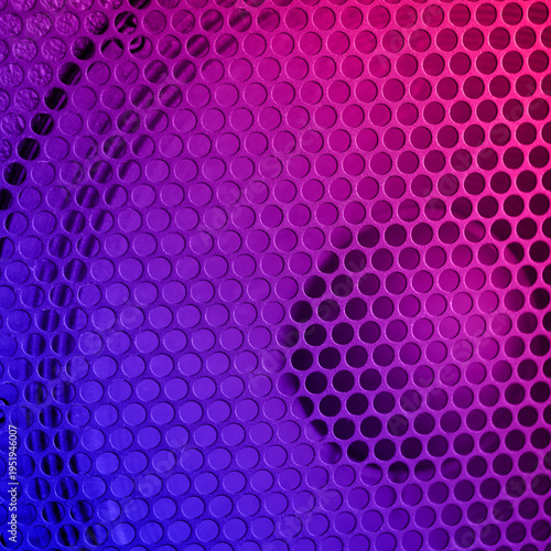 Sound Speaker grill texture. Macro. Neon color tone