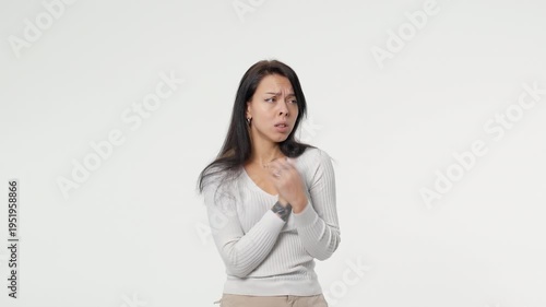 Young woman shivering and looking cold isolated on transparent background