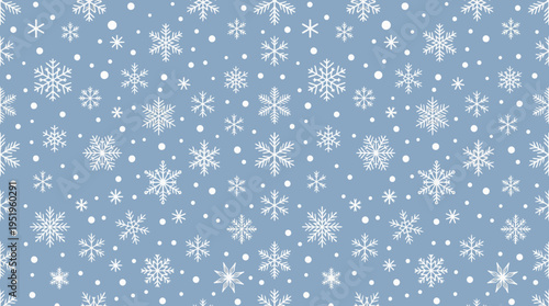Elegant frosty winter pattern with various delicate white snowflakes against a serene blue background, perfect for seasonal designs and celebrations