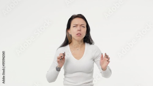 Young adult woman looks shock curiously fearfully white background isolated space