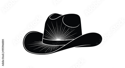 A black cowboy hat with a wide brim and high crown adorned with a decorative band and sunburst design