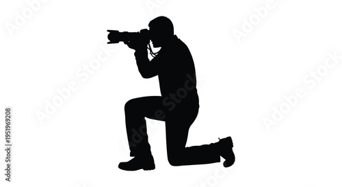 A person kneeling and taking a photo with a camera