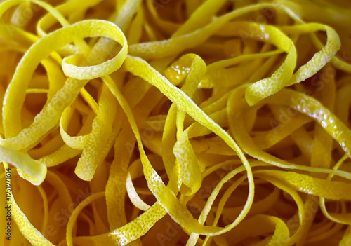 Fresh lemon peel and zest. Health food background, top view.