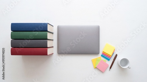 Modern Study Workspace with Stack of Books Laptop and Sticky Notes on Desk