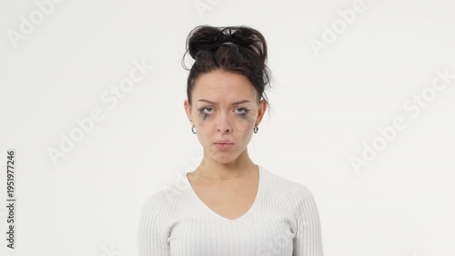Adult young woman crying smudged mascara sadness depression white background isolated space