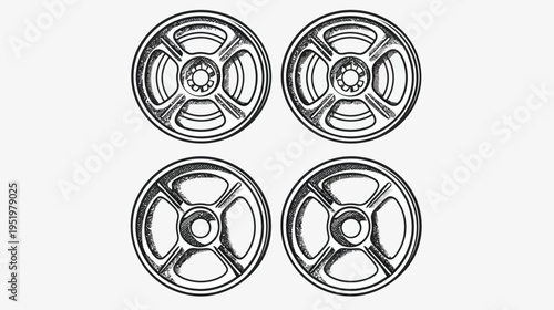 Four reel-to-reel tape spools arranged in a square formation against a white background