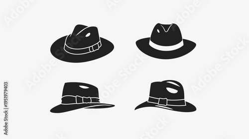 Four hats in black and white two fedoras, two ribboned