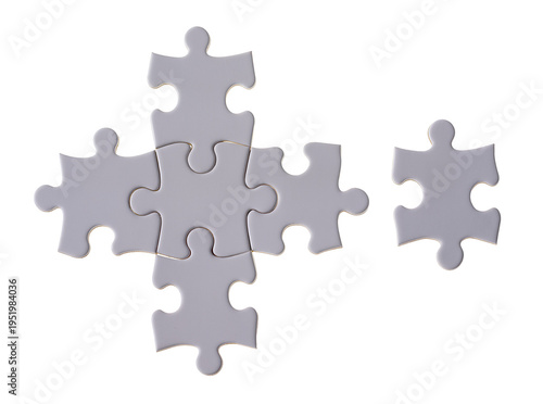 Картината върху платно Light grey jigsaw puzzle pieces forming a cross shape with one separate piece, i