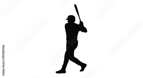 A baseball player in mid swing captured in striking silhouette