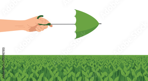 A hand holds a green umbrella being blown by wind over a dense field of green plants.