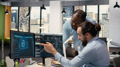 Fotografia Prop firm manager and employee looking over paperwork, using deep learning to assess stock market volatility