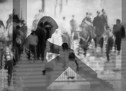 Depressed person sitting alone in crowd, loneliness and mental health concept
