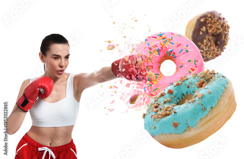 Fotografie Young sporty woman smashing donut on white background
