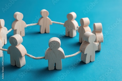 Unity in Connection: A symbolic representation of interconnectedness, as wooden figurines stand shoulder-to-shoulder, holding hands in a circular formation, embodying the strength and solidarity.