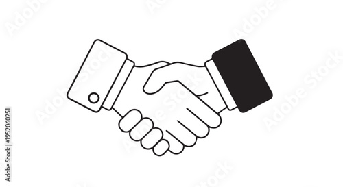 A handshake between two people in business attire