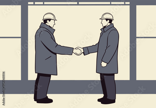 Workers shake hands at a construction site during the day while wearing hard hats and coats