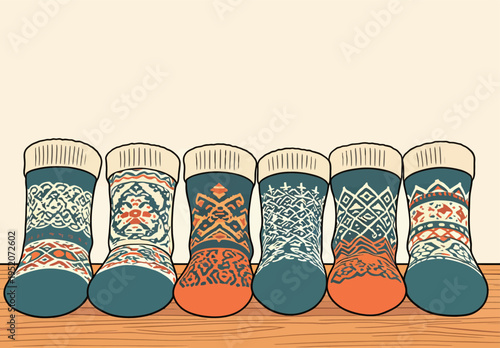 Colorful socks with patterns displayed on a wooden surface in a casual setting