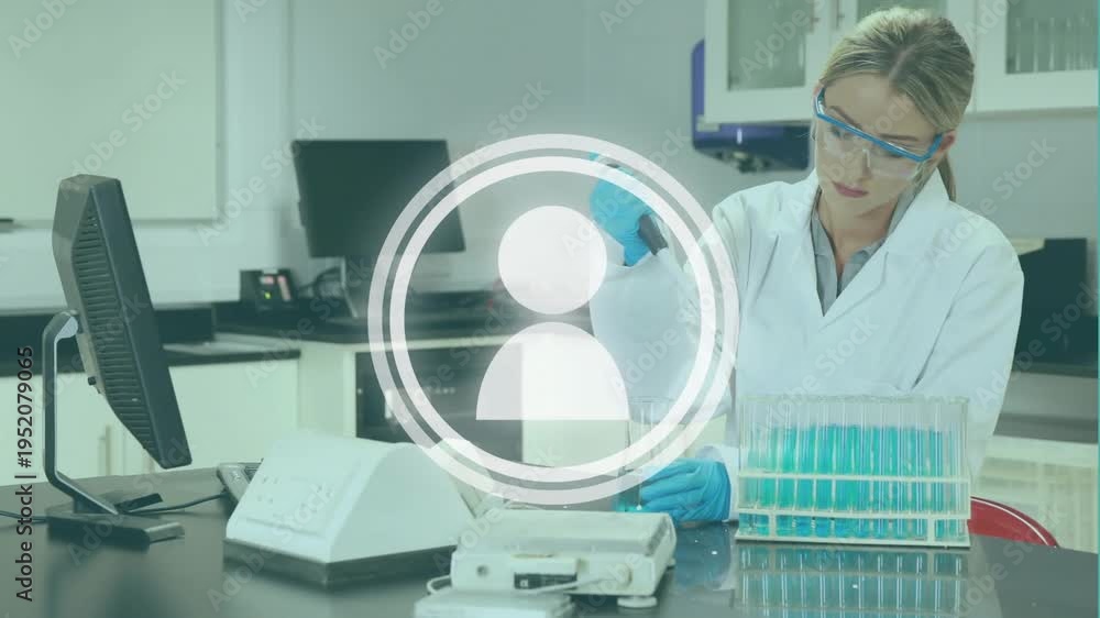 Female lab tech pipetting sample into tube rack for test after picking ...
