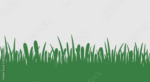 Green grass blades in a row.