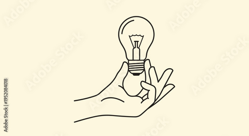 Hand holding a light bulb idea.