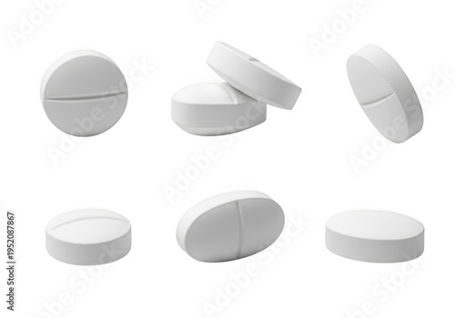 A set of white pills in different orientations
