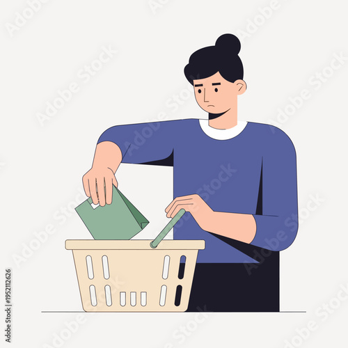 Woman putting items into a shopping basket.