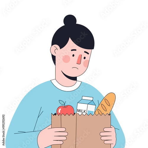 Sad young man holding a grocery bag with food items.