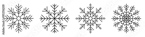 Four intricately designed snowflakes in a row with unique geometric patterns