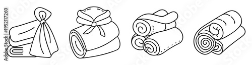 Black and white line art illustration of neatly organized towels