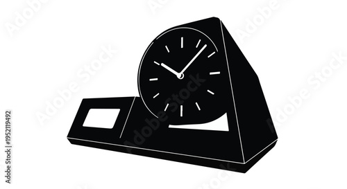 Modern black desk clock displaying time with minimalist design