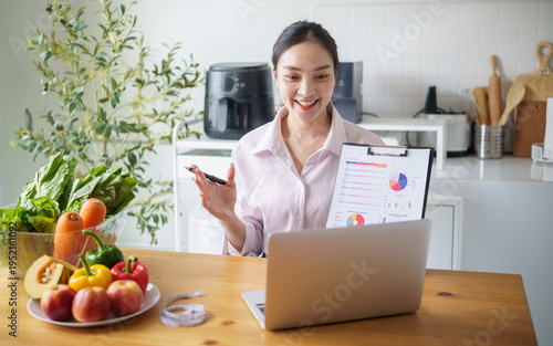 Professional dietitian giving virtual nutrition advice via laptop. Concept for healthy lifestyle, telehealth, and balanced diet guidance.
