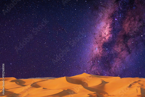 milky way and milky way over the desert in the night. the stars in the middle.