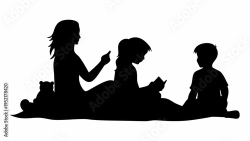 Black silhouette of family enjoying a picnic together on the ground