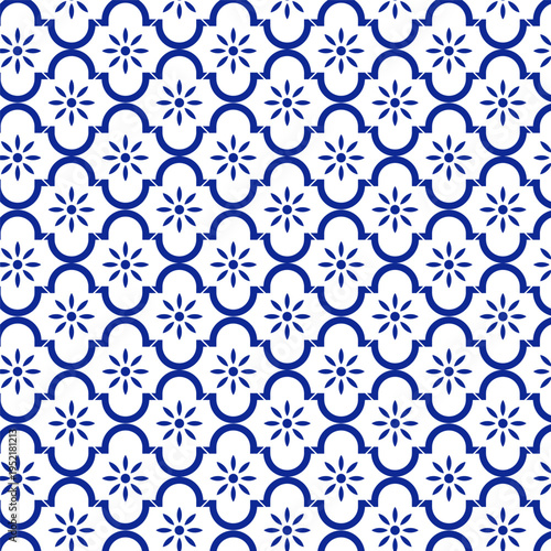 Blue Geometric Floral Tile Pattern. Seamless decorative pattern featuring blue geometric shapes and floral motifs on a clean white background.