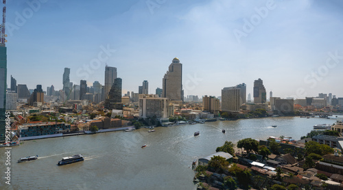 Bangkok skyline and business skyscrapers at Chaopraya river, Thailand.