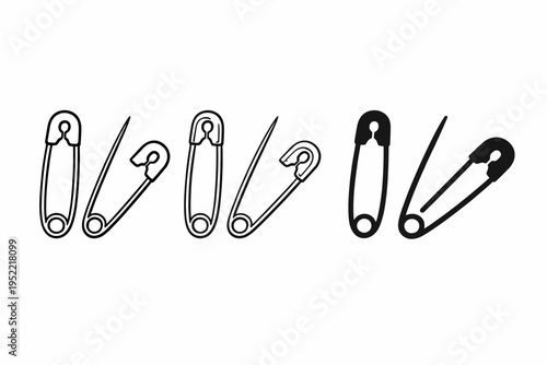A collection of safety pins in various orientations