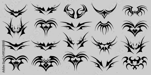 Collection of abstract black tribal wing and flame shaped designs