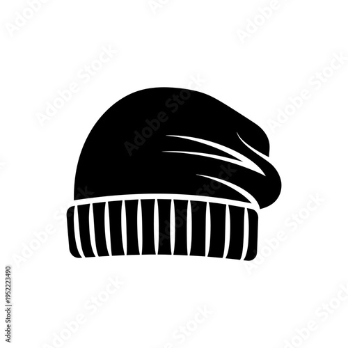 A striking black silhouette of a winter beanie hat with a folded brim a classic silhouette