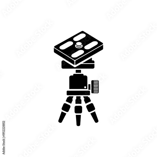 A stark black silhouette of a tripod head and legs showcasing camera mounting technology silhouette