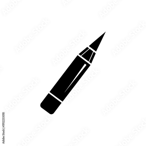 A sharply pointed black pencil lies diagonally against a plain white backdrop a striking silhouette