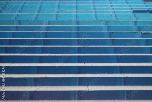 Blue concrete stairs outside office building