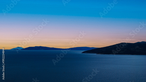 Bild auf Leinwand a splendid sunset between the islands, the sky and the sea