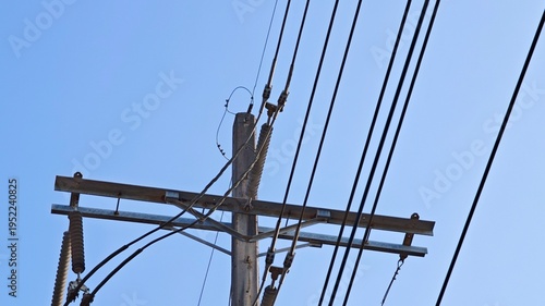 High voltage transmission tower with overhead ground wire OHGW for lightning protection.