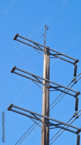 High voltage transmission tower with overhead ground wire OHGW for lightning protection.