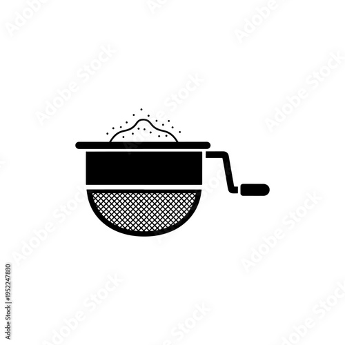 A black and white illustration of a manual grain mill with a crank handle silhouette