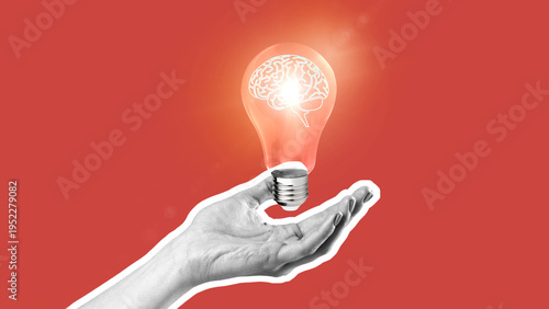 Fotografie Hand holds light bulb with brain design, symbol of ideas in creative space