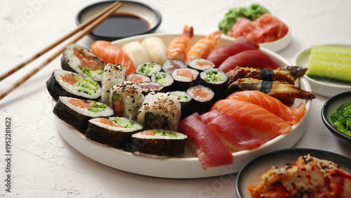 Εκτύπωση καμβά Large sushi platter with nigiri and maki rolls on white background