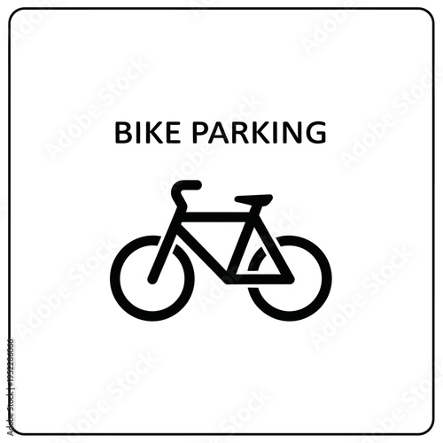 Black and white bike parking sign with bicycle icon and text