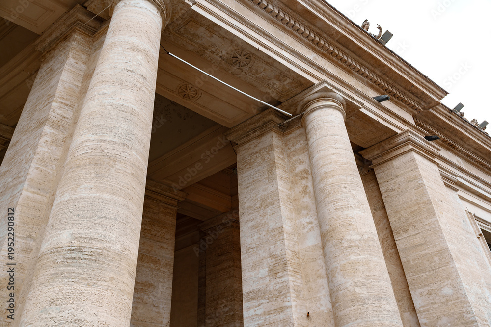 Fototapeta premium Columns support large structure at historical site in city